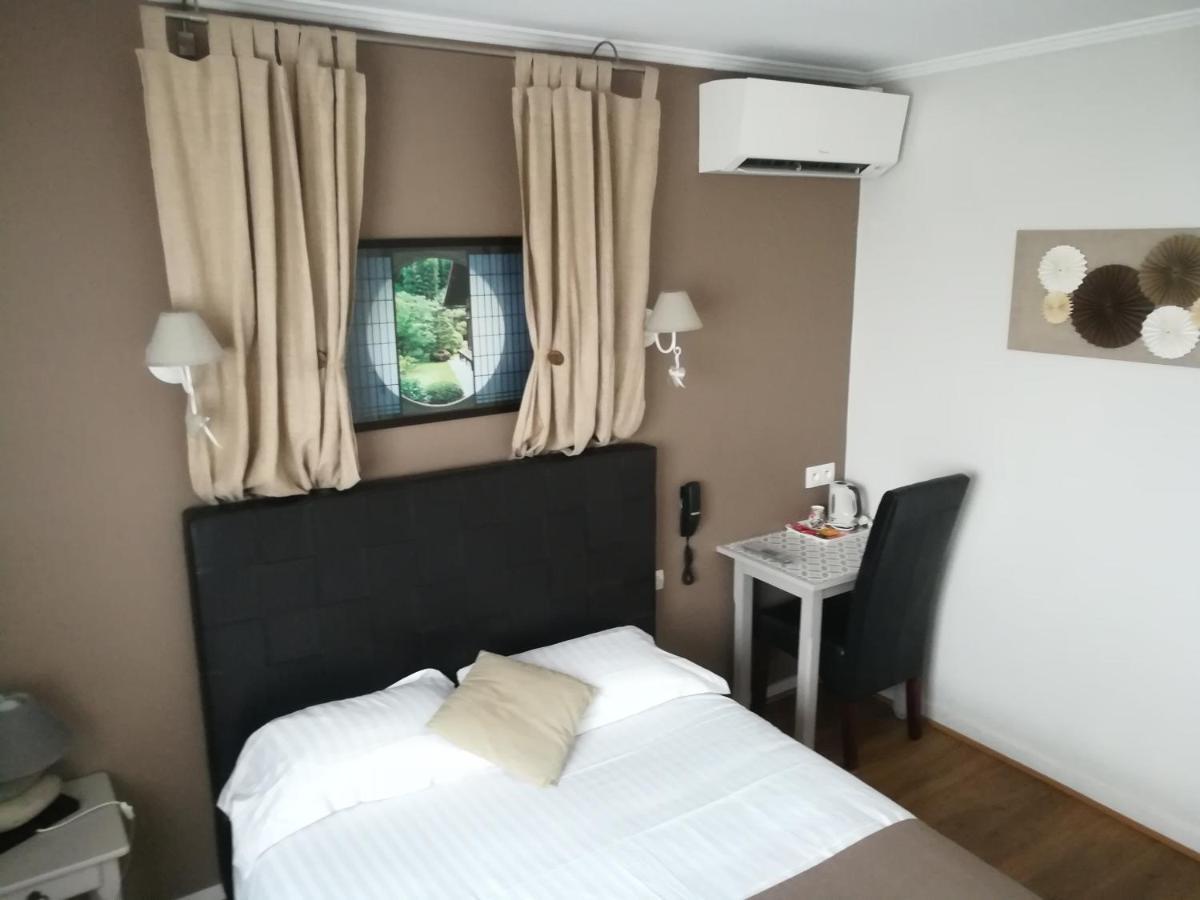 Contact Hotel Du Relais 图阿尔 外观 照片